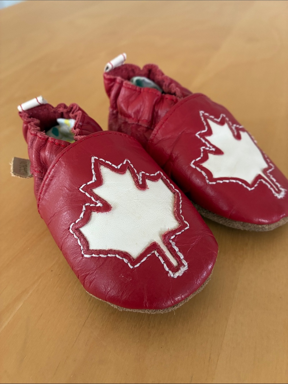 Robeez Red Baby Moccasins with White Maple Leaf - size 0-6 months